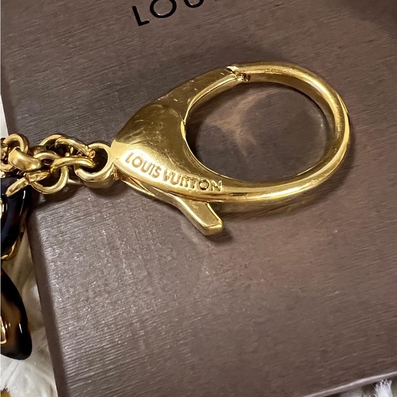 Authentic Louis Vuitton Insolence Bag Charm
Brass Hardware - Picture 3 of 5